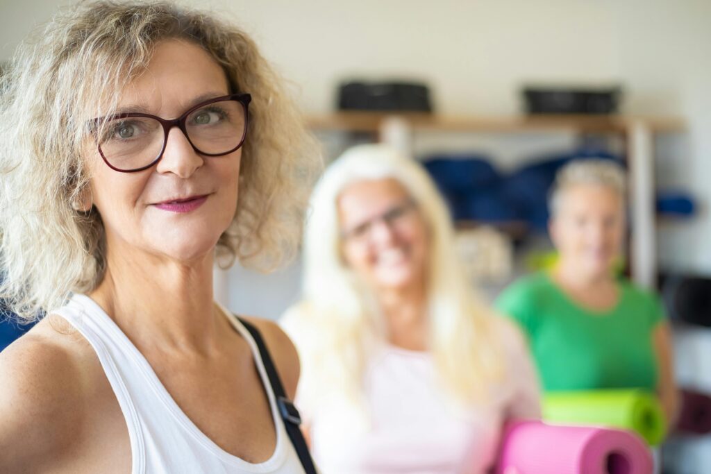 pexels-photo-5992894-5992894 Group of senior women enjoying a fitness class with yoga mats. Positive and active lifestyle.